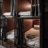 Отель Nesvit Capsule Hotel. Место в мужском 8-местном номере  1